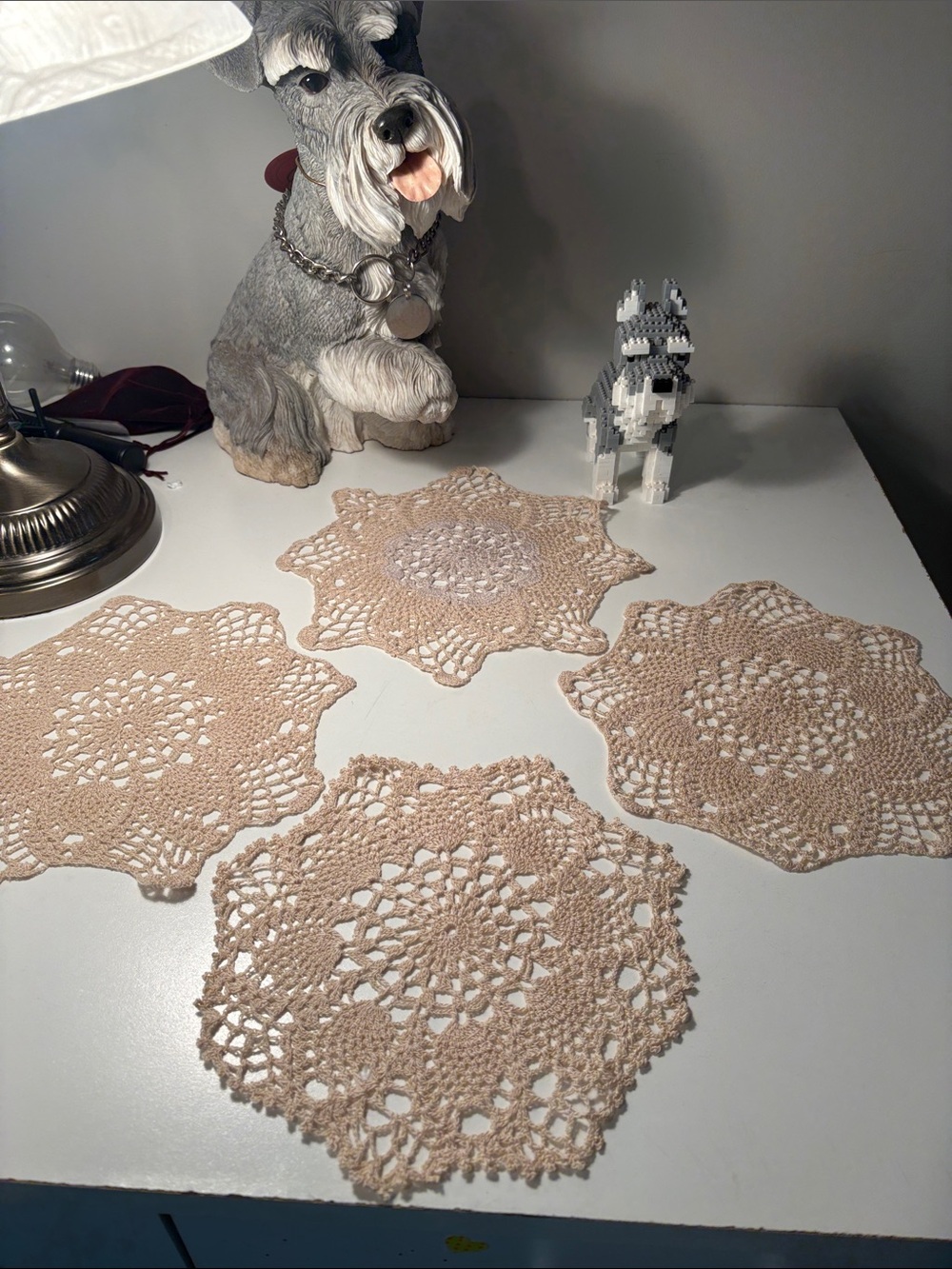 Vintage set of four handmade doilies